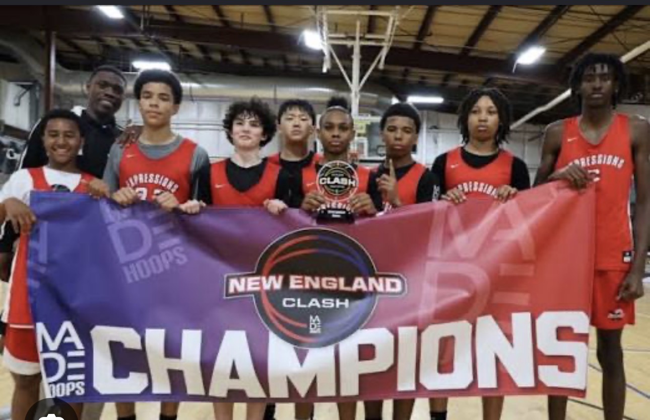 Expressions players holding the MADE Hoops New England Clash champions banner