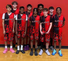 Expressions youth team photo in red and black uniforms