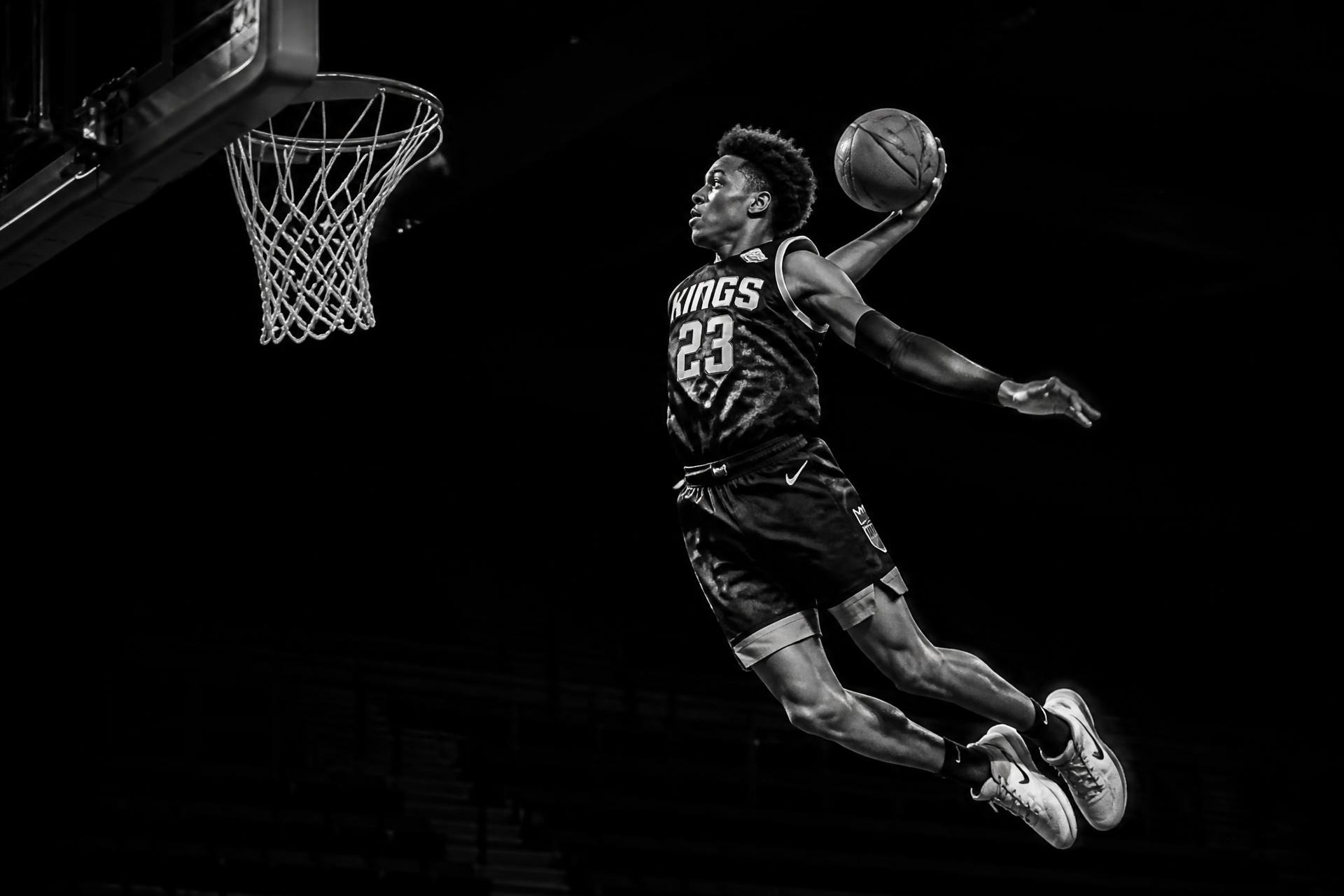 Expressions Basketball athlete rising for a dunk